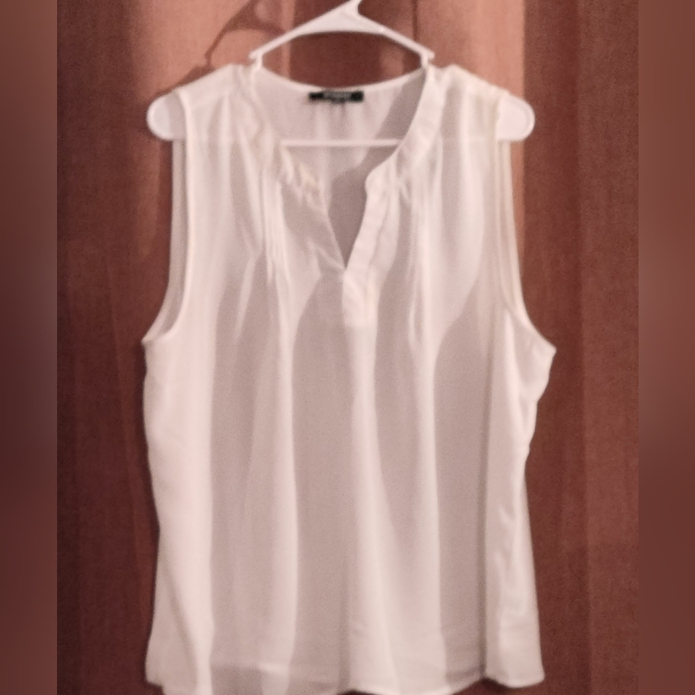 White sleeveless top